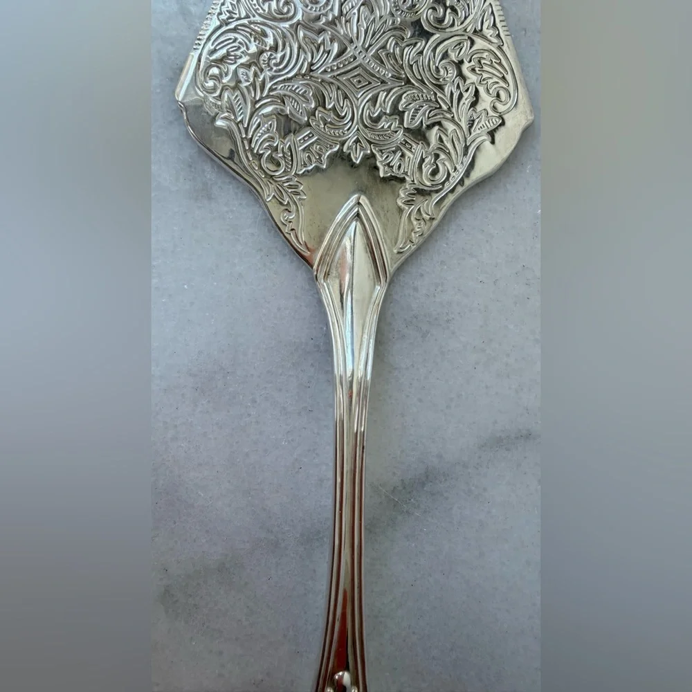 vintage silver-plated pie or cake server, frequently produced in Italy